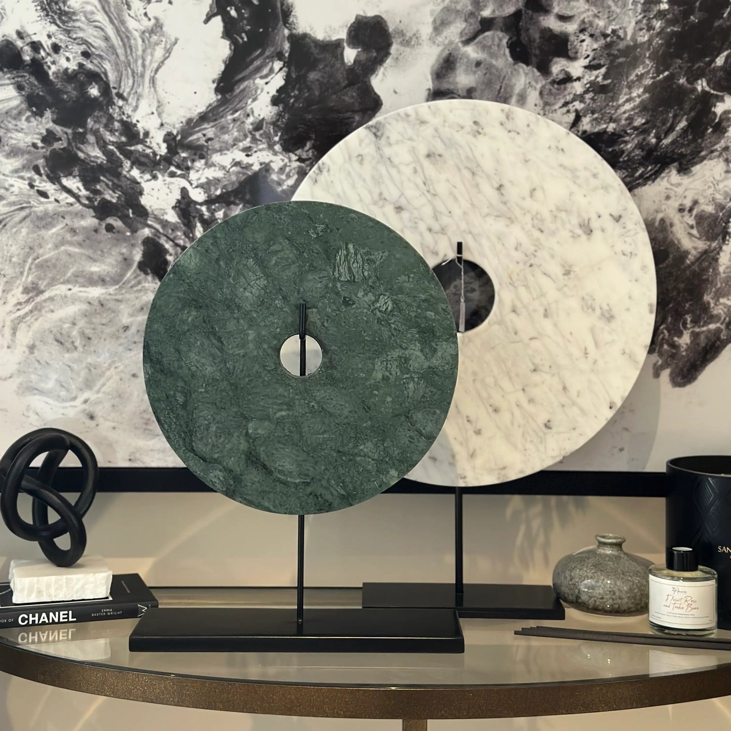 white-and-green-marble-discs-on-matt-black-stands-on-coffee-table-at-albury-house-interiors