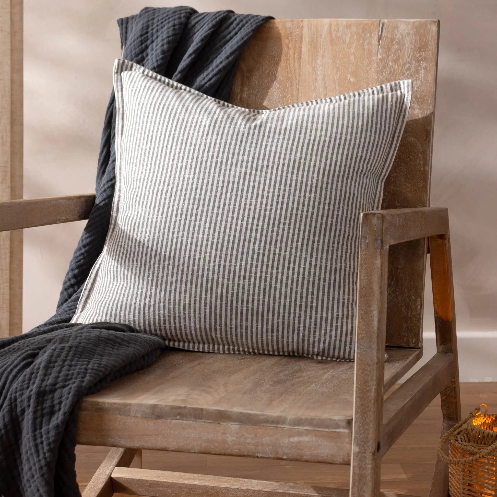 square-pinstripe-cotton-cushion-with-grey-and-white-pinstripes-filled-with-feathers-at-albury-house-interiors
