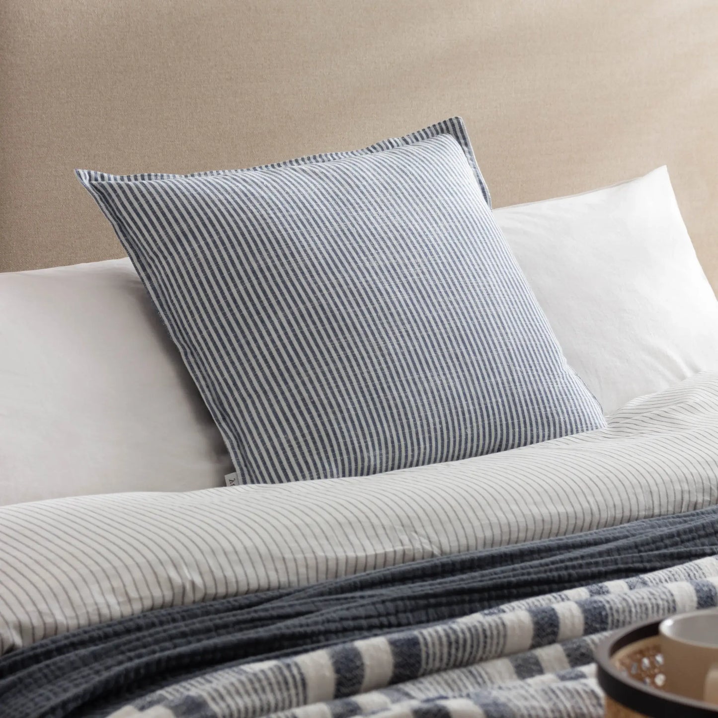 cotton-square-cushion-with-oxford-refined-edge-and-double-sided-blue-and-white-pinstripe-design-at-albury-house-interiors 