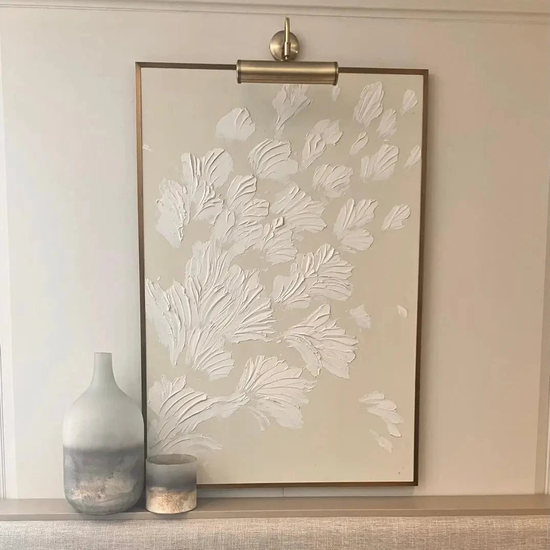 pluto-abstract-oxidised-grey-beige-vase-and-candle-holder-on-shelf-with-artwork-and-banquette-seating-at-albury-house-interiors
