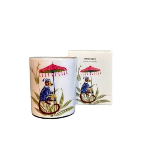 pomegranate-noir-scented-candle-in-glass-jar-with-monkey-umbrella-featured-on-the-front-in-gift-box-at-albury-house-interiors