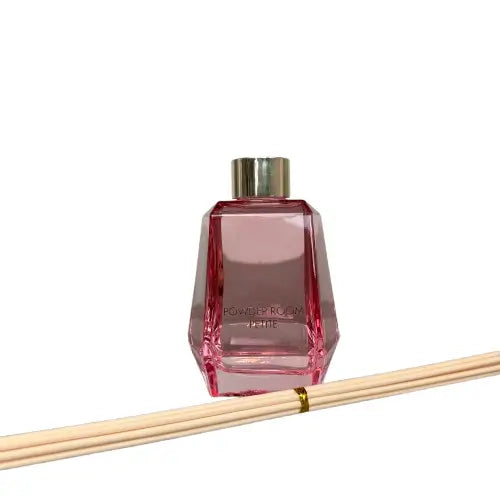 pink-glass-powder-room-reed-diffuser-with-rose-and-oud-scent-comes-gift-boxes-with-wooden-reeds-from-albury-house-interiors