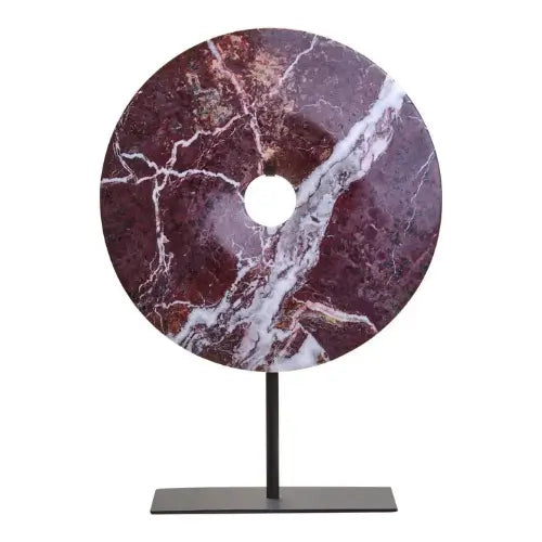 natural-red-and-white-veined-marble-disc-sculpture-on-matt-black-stand-at-albury-house-interiors-as-used-by-interior-designers