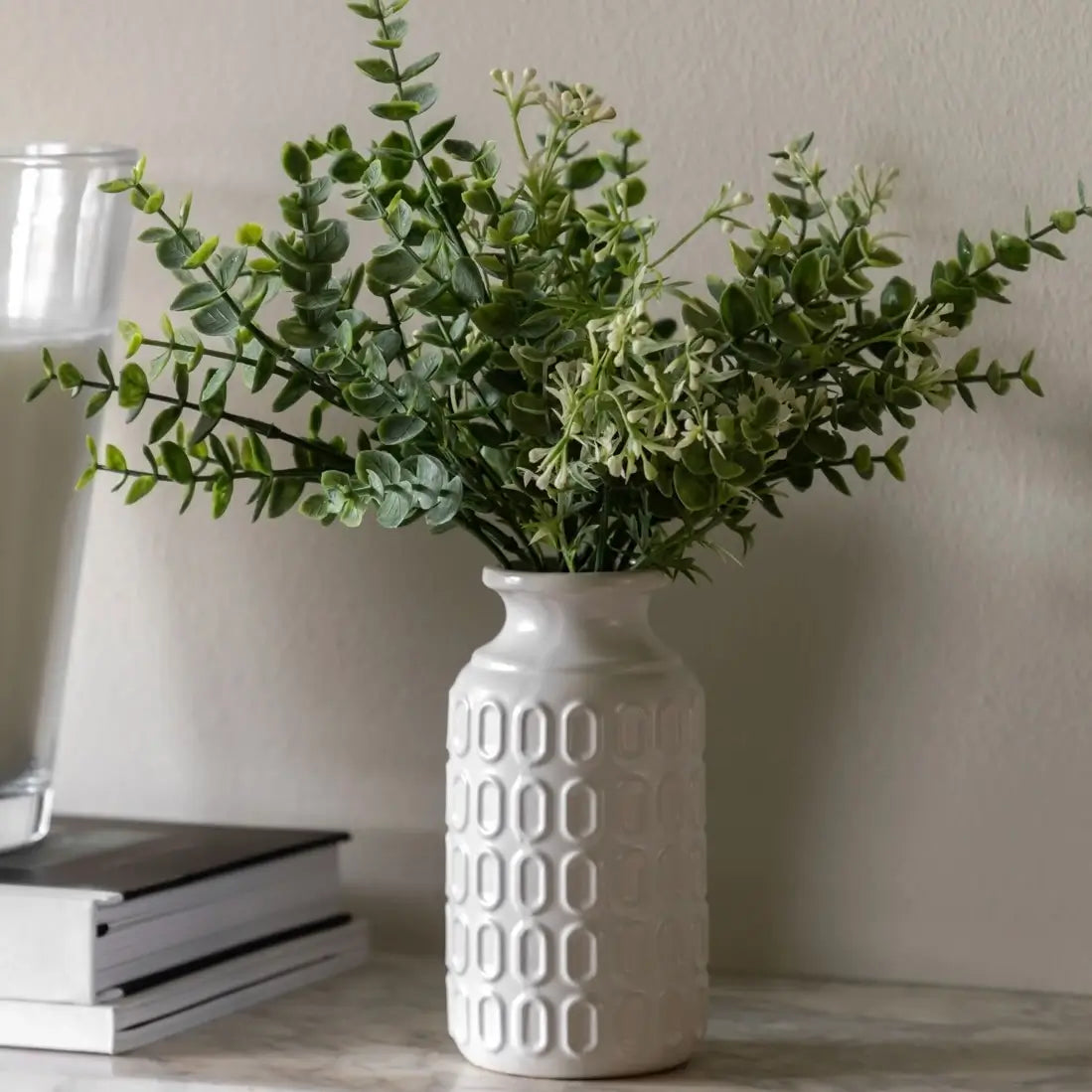 white-ceramic-retro-pattern-vase-with-faux-green-foliage-and-eucalyptus-at-albury-house-interiors-essex