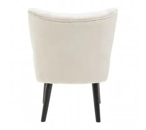 Sorrento plush cream velvet occasional chair with pleated detailing on backrest, matching cream piped edges and black wooden legs, at Albury House Interiors 