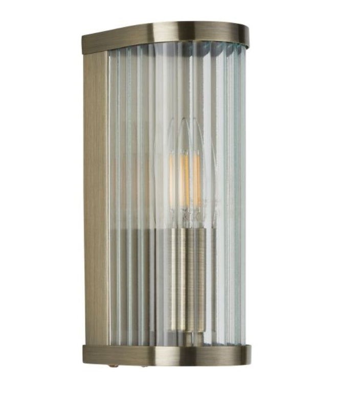 Ribbed glass and brass wall light with one bulb available at Albury House Interiors