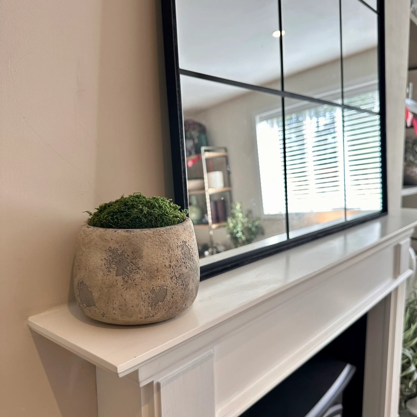rustic-antique-cement-preserved-moss-bowl-on-white-mentelpiece-with-black-mirror-at-albury-house-interiors-home-decor-shop-essex-hertfordshire