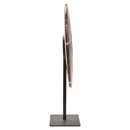 natural-red-and-white-veined-marble-disc-sculpture-on-matt-black-stand-at-albury-house-interiors-as-used-by-interior-designers