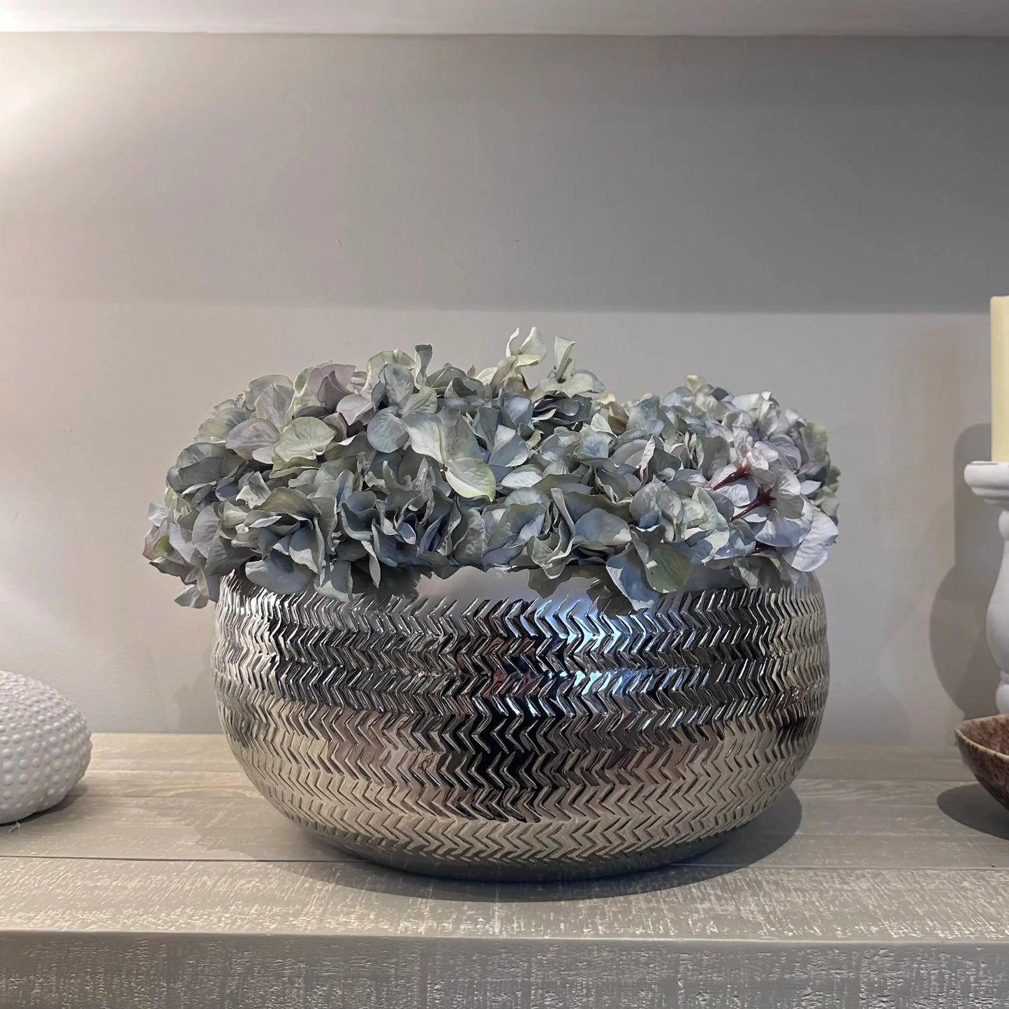 chrome-silver-herringbone-pattern-embossed-large-bowl-with-pastel-faux-hydrangeas-at-albury-house-interiors-matching-tye-essex