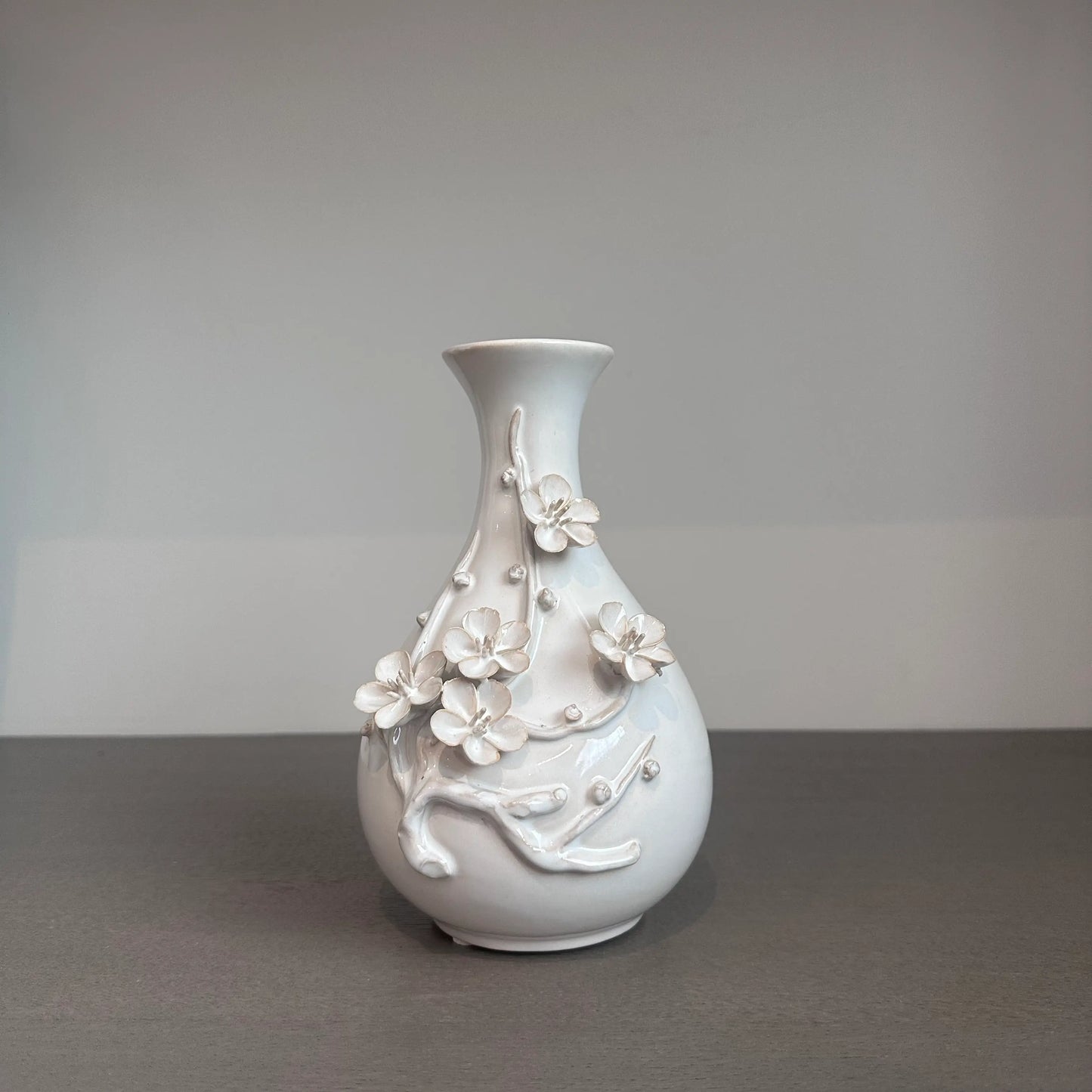 White ceramic vase with 3d intricate floral design at Albury house interiors 