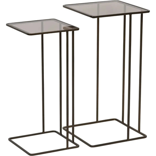 Set of two nesting sofa tables with smoked glass tops and antique bronze metal frames, available to purchase from Albury House Interiors - homewares and free standing furniture in the UK.