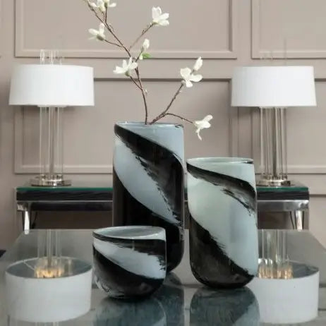 Black and grey glass swirl planter and vases in size small and large, perfect for faux flowers or real plants and fresh flowers. Available to purchase at Albury House Interiors, homewares and home decor shop in Essex. 