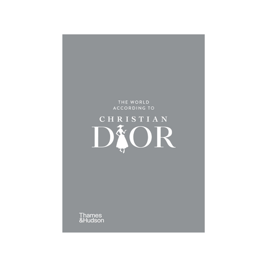'The World According To Christian Dior' chrome silver effect hardback coffee table book by Thames and Hudson, available to purchase at Albury House Interiors.