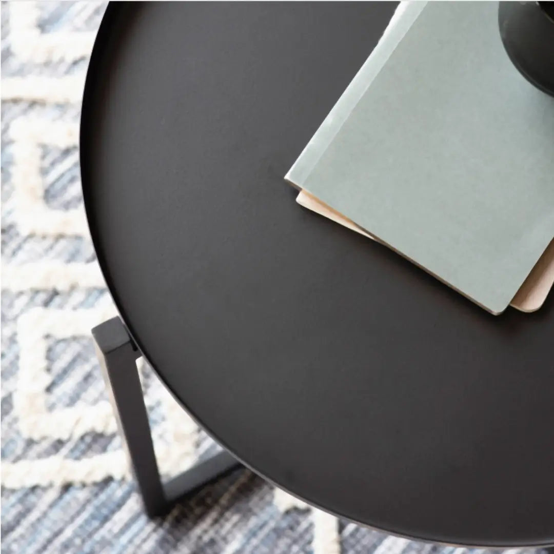 Black metal round side table with matching black legs and removable tray top, available to purchase from Albury House Interiors, homewares in the UK. 