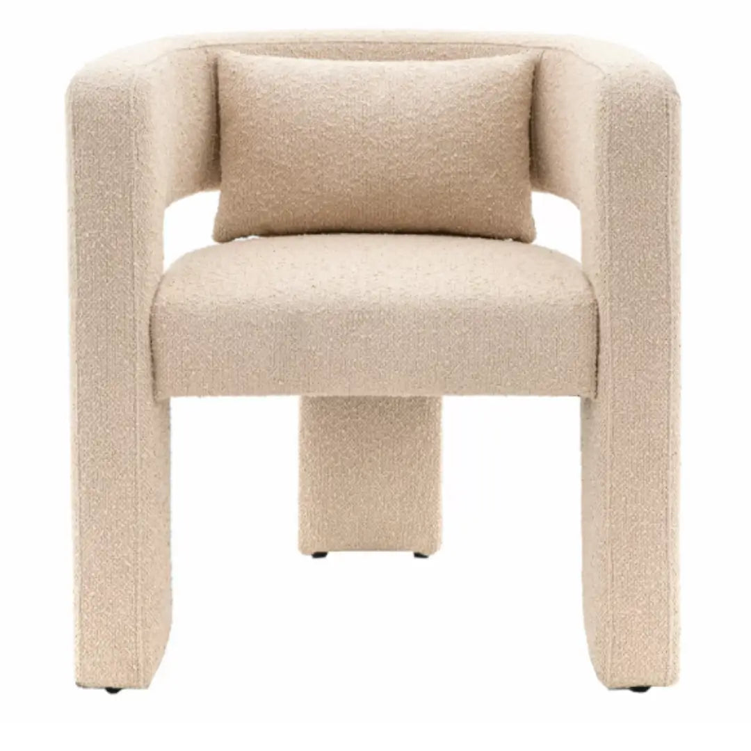 Torrent curved tub chair with three wide legs, upholstered in a beautiful neutral boucle material with matching bolster cushion. Perfect to use as dining chairs or occasional chairs in bedrooms or living rooms. Available to purchase from Albury House Interiors. 