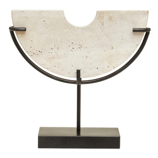 Natural travertine stone crafted into a half moon semi-circle shape, displayed on a matte black stand. Used by interior designers and home stylists. Available to purchase at Albury House Interiors. 