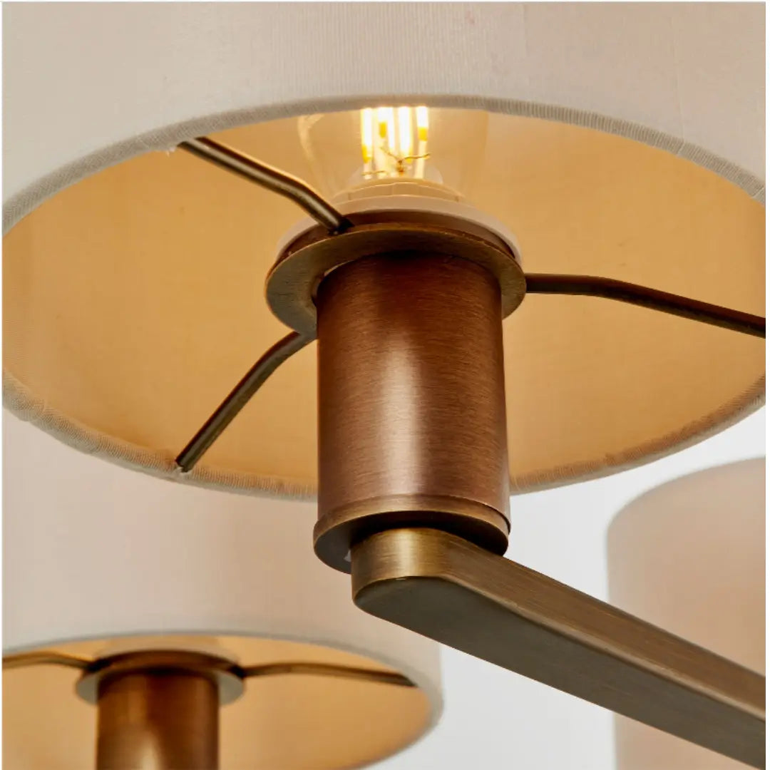 Trevi five arm ceiling pendant finished in antique dark bronze, complete with 5 faux silk shades. Whole collection available to purchase from Albury House Interiors. 