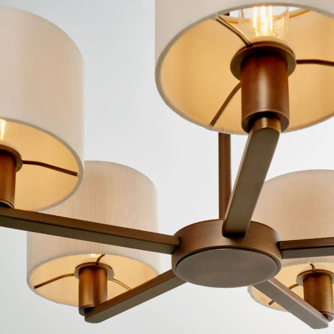 Trevi five arm ceiling pendant finished in antique dark bronze, complete with 5 faux silk shades. Whole collection available to purchase from Albury House Interiors. 