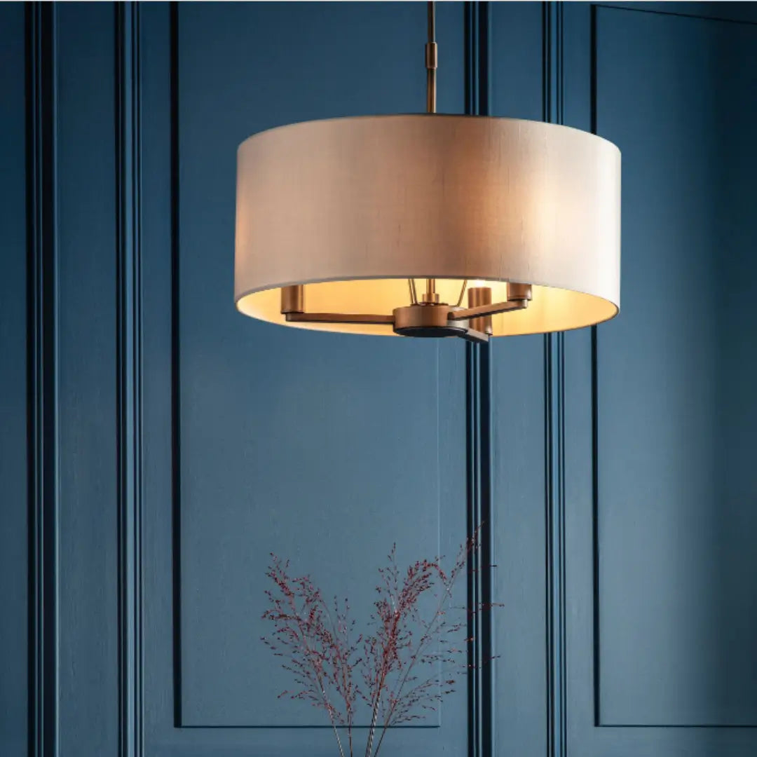 Trevi antique brushed bronze finish ceiling light, with 3 arms and bulbs. Complete with faux silk shade. Whole collection available to purchase at Albury House Interiors.