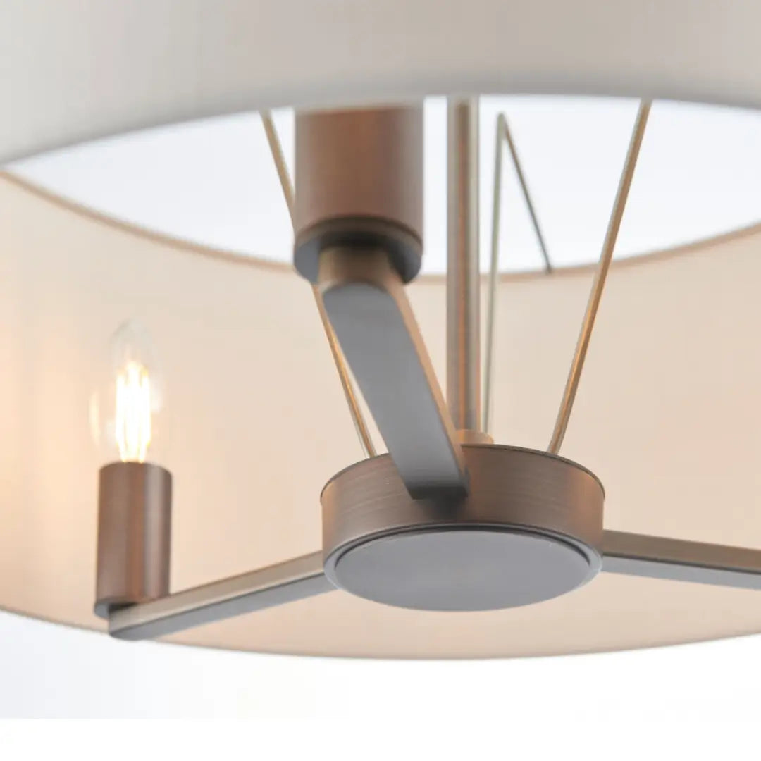Trevi antique brushed bronze finish ceiling light, with 3 arms and bulbs. Complete with faux silk shade. Whole collection available to purchase at Albury House Interiors.