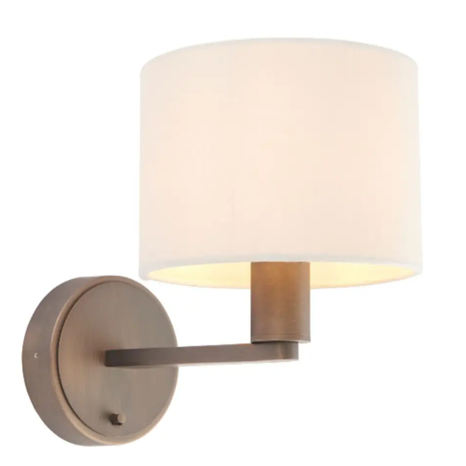 Trevi antique brushed bronze wall light sconce, with white marble faux silk shade and on/off switch. Available to purchase from Albury House Interiors, with matching ceiling lights available.