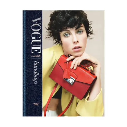 navy-vogue-essentials-handbags-coffee-table-book-at-albury-house-interiors-essex
