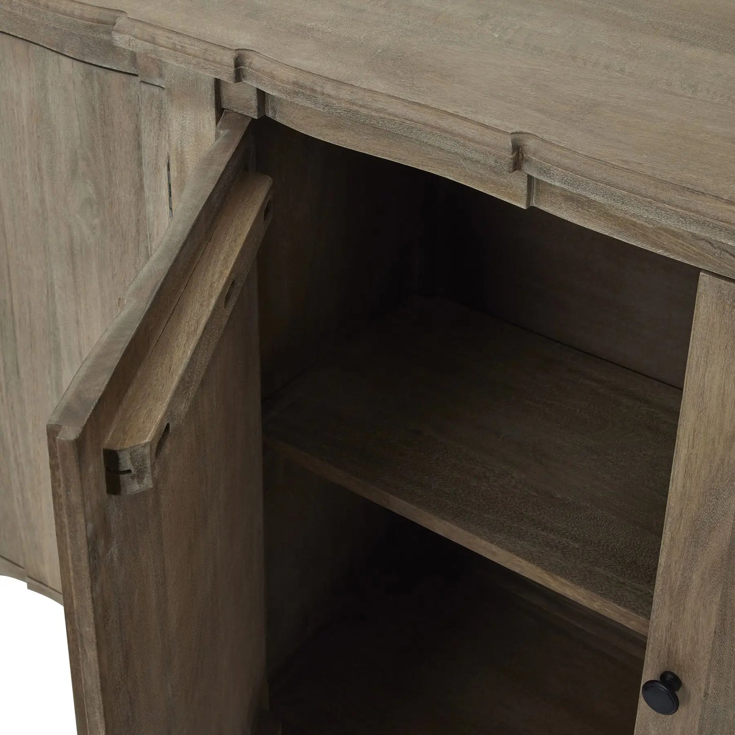 Solid wood 4 door sideboard with internal shelf and black iron handles. Beautiful in all interiors and colour schemes, available to purchase from Albury House Interiors, homewares and furniture in the UK. 