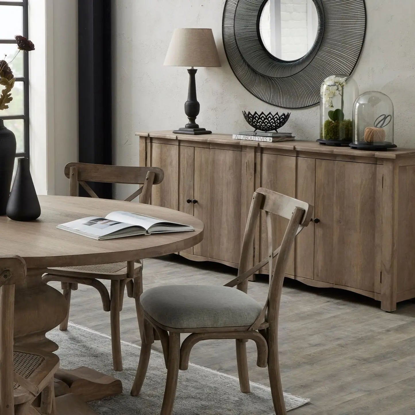 Solid wood 4 door sideboard with internal shelf and black iron handles. Beautiful in all interiors and colour schemes, available to purchase from Albury House Interiors, homewares and furniture in the UK. 