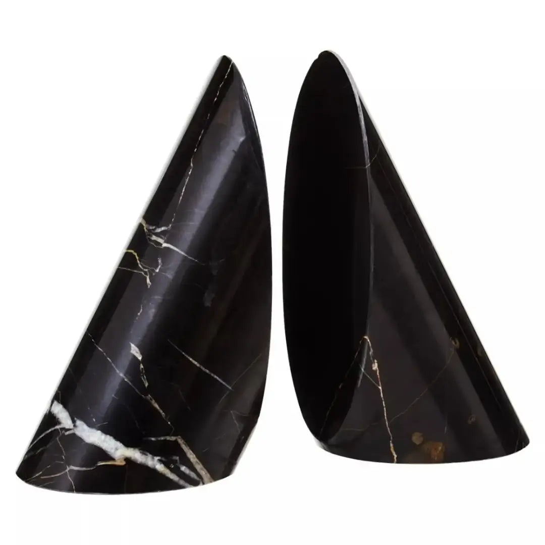 Black and white veined natural marble wedge triangle shaped bookends, available at Albury House Interiors, Essex. 