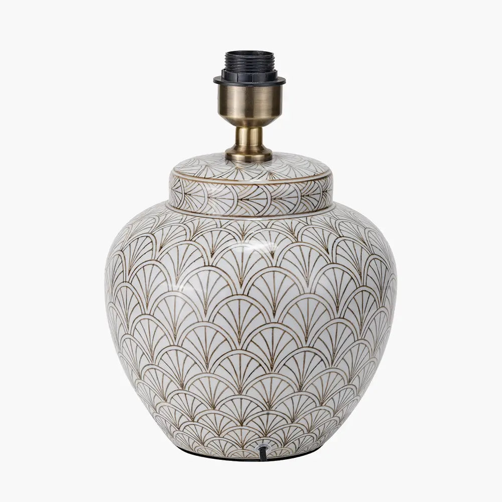 white-ceramic-lamp-base-with-art-deco-fan-repeating-pattern-and-brass-detailing-at-albury-house-interiors