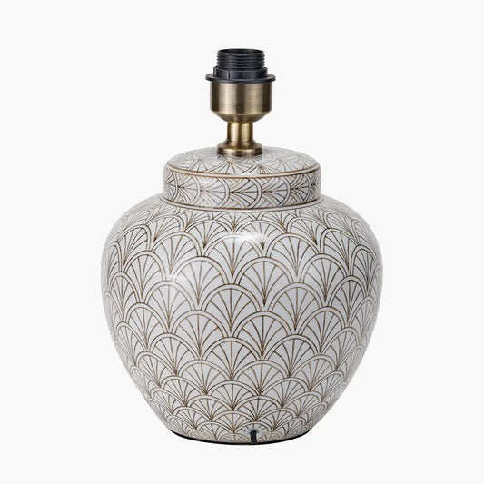 white-ceramic-lamp-base-with-art-deco-fan-repeating-pattern-and-brass-detailing-at-albury-house-interiors