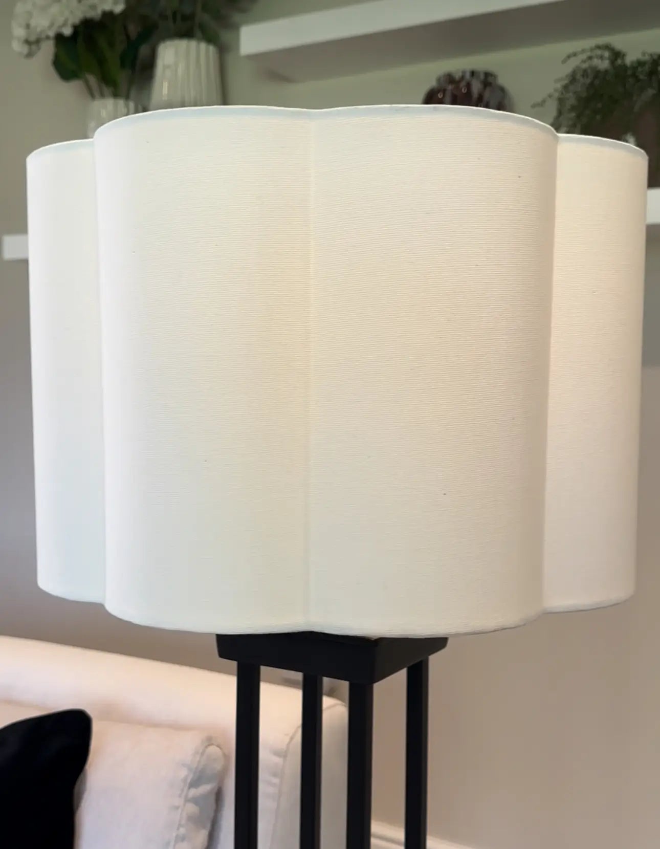 White woven cotton scalloped scape lampshade, paired with black iron column table lamp base. Available at Albury House Interiors.