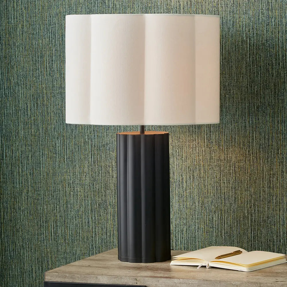 White woven cotton scalloped scape lampshade, paired with black iron scalloped table lamp base. Available at Albury House Interiors.
