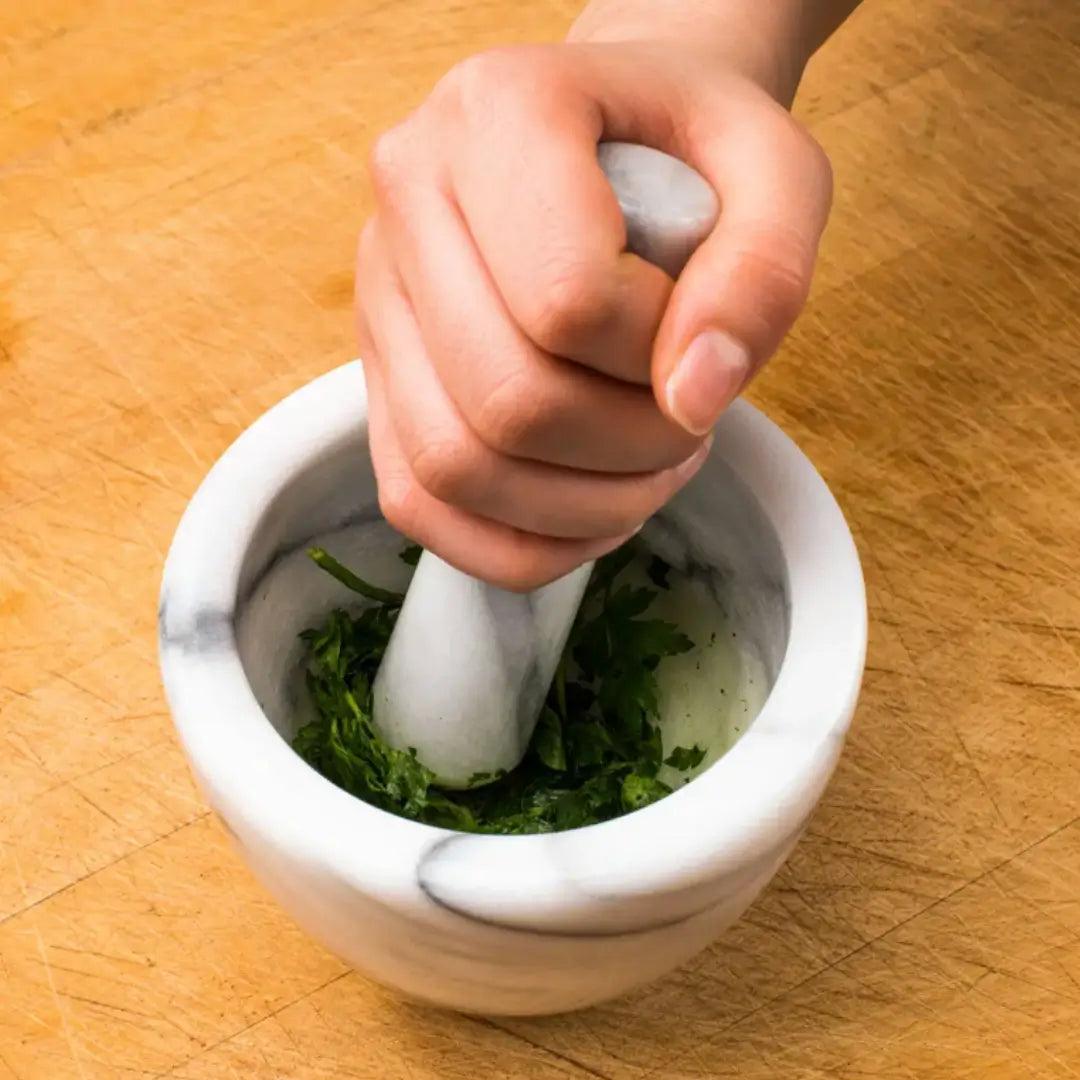 White and black natural veined marble mortar and pestle. Both stylish and functional for use in all kitchens. Available to purchase from Albury House Interiors. 